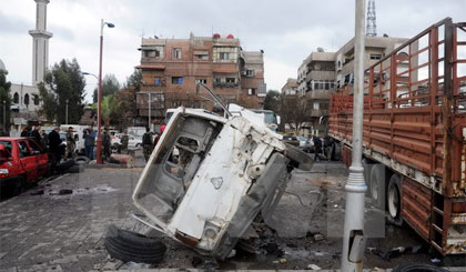 Hiện trường sau vụ đánh bom ở Damascus, Syria ngày 11-3. Nguồn: THX/TTXVN